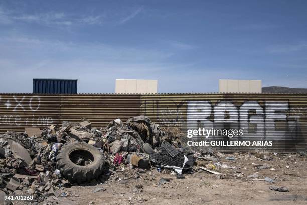 View of the border fence near wall prototypes at the US-Mexico border in Tijuana, northwestern Mexico, on April 3, 2018. - President Donald Trump on...