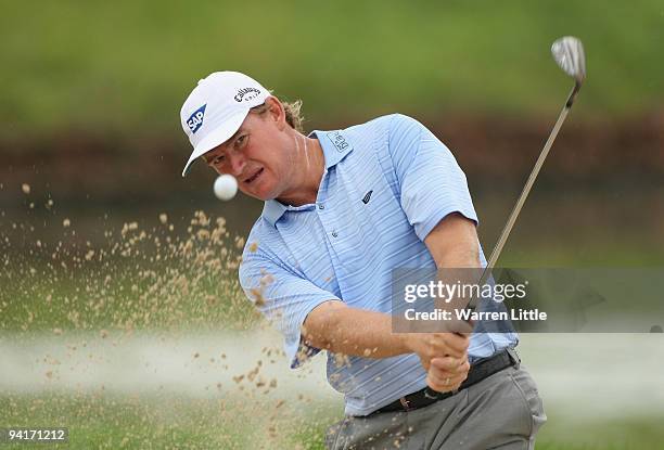 Ernie ELs of South Africa plays out of the 16th greenside bunker during practice before the Alfred Dunhill Championship at Leopard Creek Country Club...