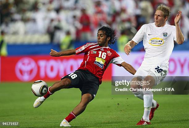 Jason Hayne of Auckland City and Hassan Ali of Al Ahli battle for the ball during the FIFA Club World Cup match between Al Ahli and Auckland City at...