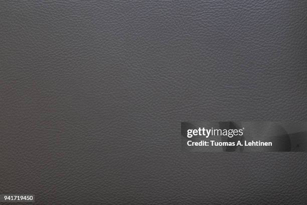 surface of dark gray faux leather for textured background - matte finish stock pictures, royalty-free photos & images