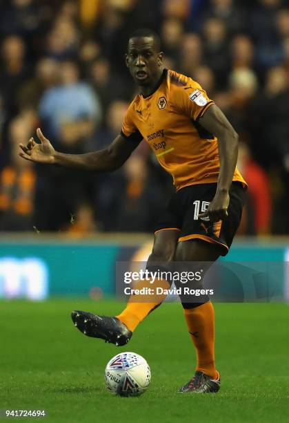 Willy Boly of Wolverhampton Wanderers passes the ball during the Sky Bet Championship match between Wolverhampton Wanderers and Hull City at Molineux...