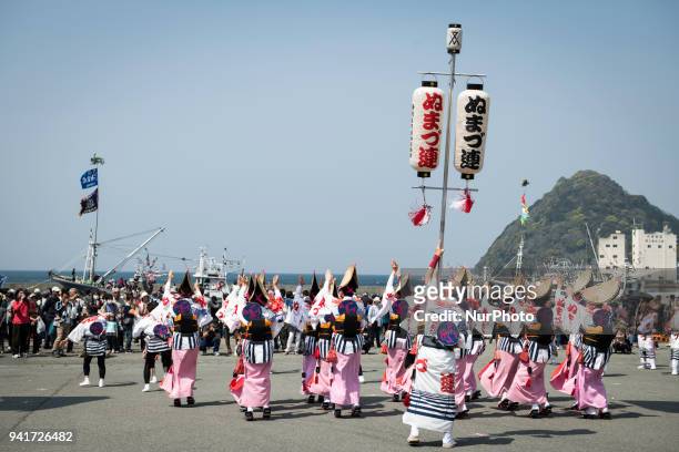 Festival participants performs a Japanese traditional dance called &quot;Odori&quot; during the Ose Matsuri/festival held at Uchiura fishing port in...