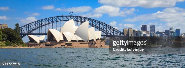 sydney opera house and the sydney harbour bridge, australia - kelvinjay stock pictures, royalty-free photos & images