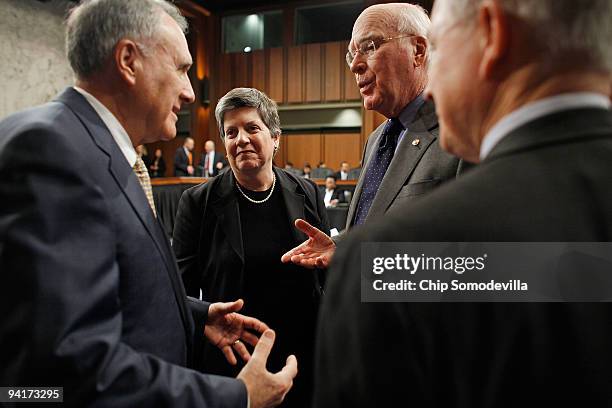 Homeland Security Secretary Janet Napolitano talks with Senate Judiciary Committee Chairman Patrick Leahy , committee member Sen. Jon Kyl and...