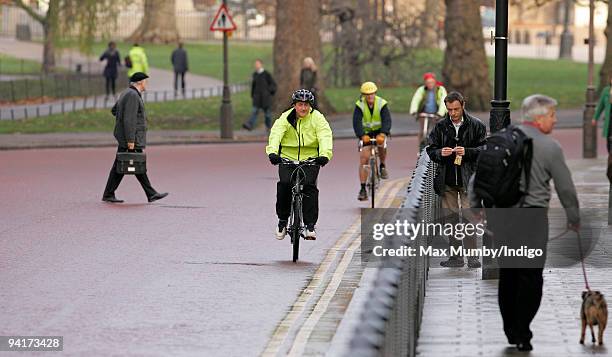 Conservative Leader, David Cameron cycles to the House of Commons on December 9, 2009 in London, England.