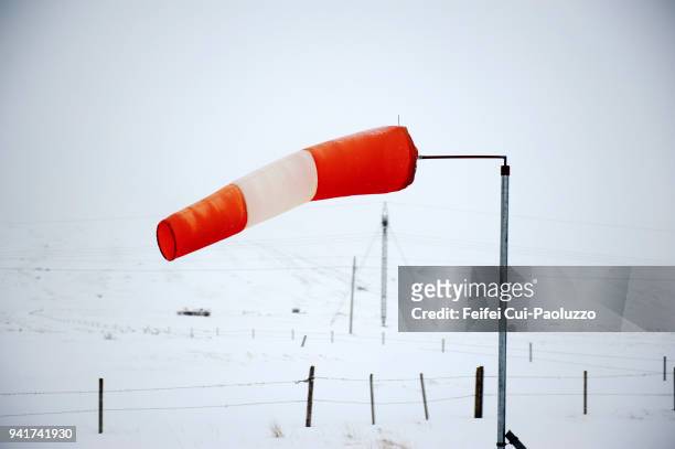 red and white wind sign near solfoss, southern iceland - gale stock-fotos und bilder
