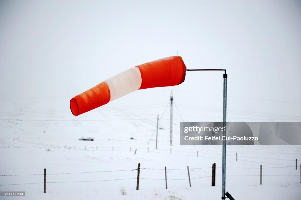 Red and white wind sign near Solfoss, Southern Iceland