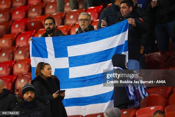 Fans of Greece hold up a flag during the International Friendly match between Egypt and Greece at Stadion Letzigrund at Letzigrund on March 27, 2018...