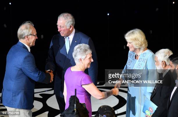 Gold Coast Commonwealth Games Organising Committee Chairman Peter Beattie shakes hands with Britain's Prince Charles as Commonwealth Games Federation...