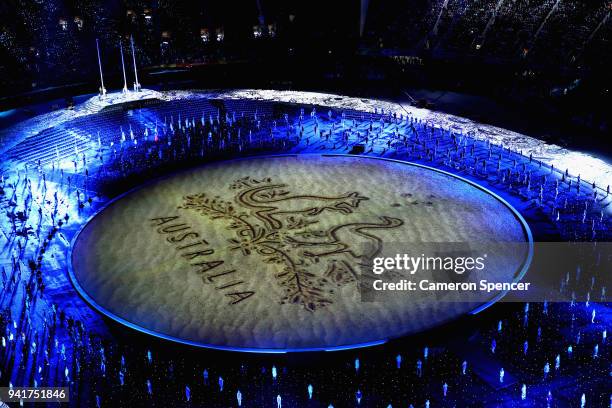 General view of a light projection during the Opening Ceremony for the Gold Coast 2018 Commonwealth Games at Carrara Stadium on April 4, 2018 on the...