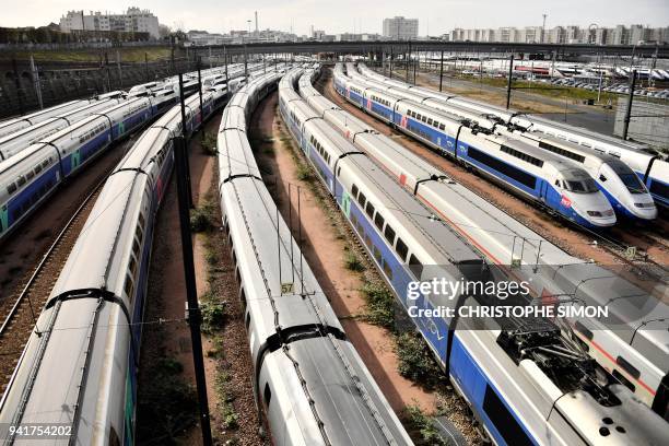 High speed trains stand stationery on tracks outside the Gare de Lyon tran station on April 4, 2018 in Paris, on the second day of three months of...