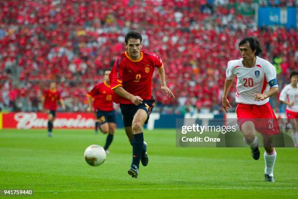 Fernando Morientes of Spain and Myung Bo Hong of South Korea during the Quarter Final of World Cup match between Spain and South Korea on 22th June...
