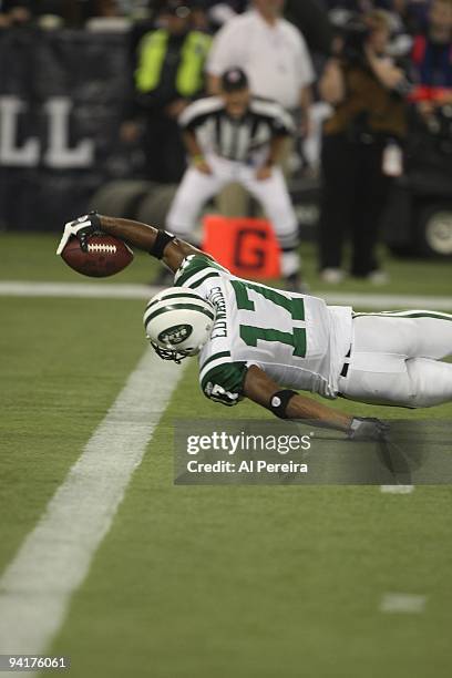 Wide Receiver Braylon Edwards of the New York Jets stretches into the end zone for a Touchdown when the New York Jets face the Buffalo Bills at...