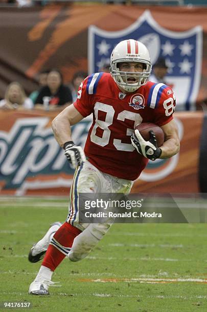 Wes Welker of the New England Patriots carries the ball during a NFL game against the Miami Dolphins at Land Shark Stadium on December 6, 2009 in...