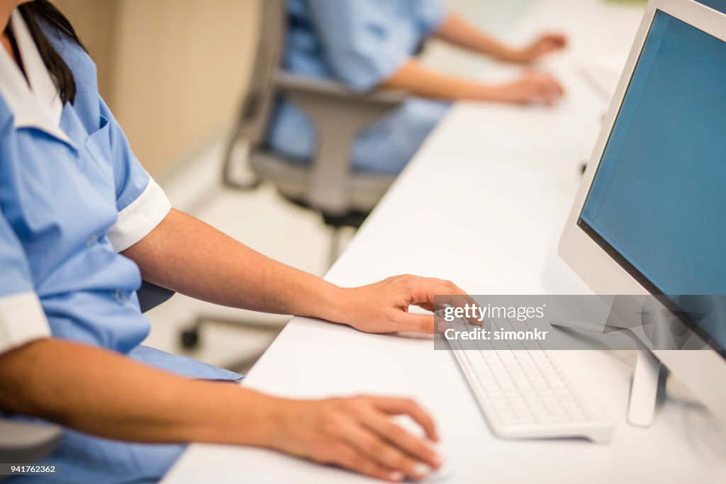 Receptionist using computer