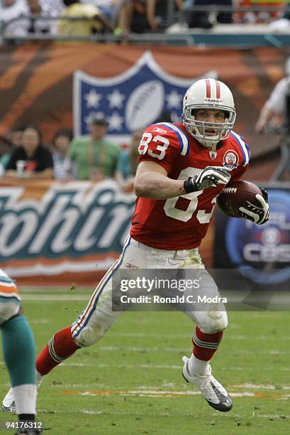 Wes Welker of the New England Patriots caries the ball during a NFL game against the Miami Dolphins at Land Shark Stadium on December 6, 2009 in...