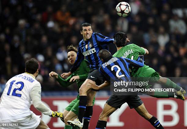 Rubin Kazan Ecuadorian midfielder Christian Noboa is tackled by Inter Milan's defender Ivan Ramiro Bordoba during their Group F Champion's League...