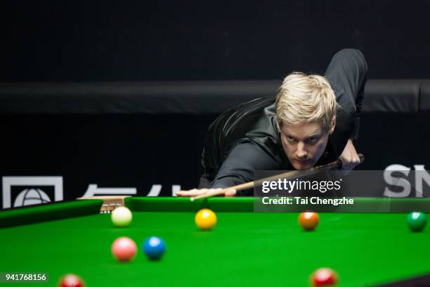 Neil Robertson of Australia plays a shot in the second round match against Sam Craigie of England during day three of the 2018 China Open at Olympic...