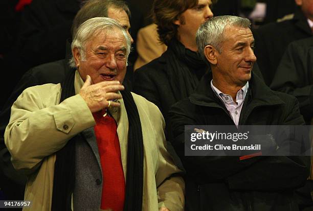 Entertainer Jimmy Tarbuck chats with former Liverpool player Ian Rush prior to the UEFA Champions League Group E match between Liverpool and...