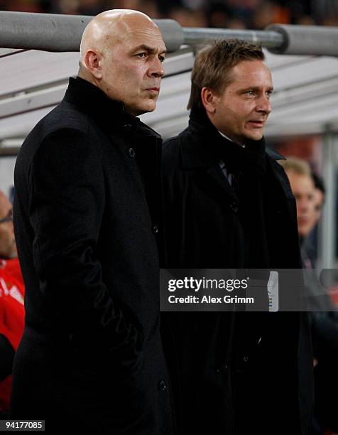 New head coach Christian Gross of Stuttgart stands next to manager Horst Heldt before the UEFA Champions League Group G match between VfB Stuttgart...