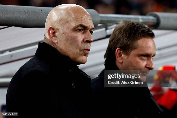 New head coach Christian Gross stands next to manager Horst Heldt before to the UEFA Champions League Group G match between VfB Stuttgart and Unirea...