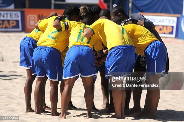 Brazilian players gather in the arena before their beach soccer match against Argentina for the South American Beach Games at Pocitos Beach on...