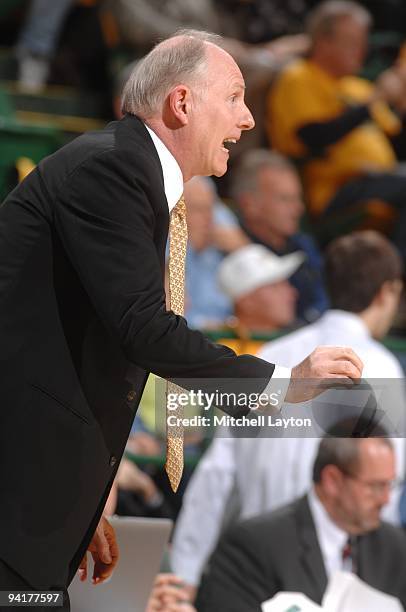 Jim Larranaga, head coach of the George Mason Patriots, talks to his players during a college basketball game against the Dayton Flyers on December...