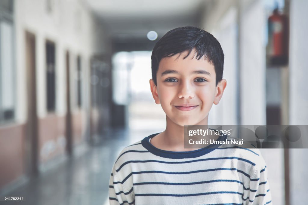 Portrait of a young school boy smiling