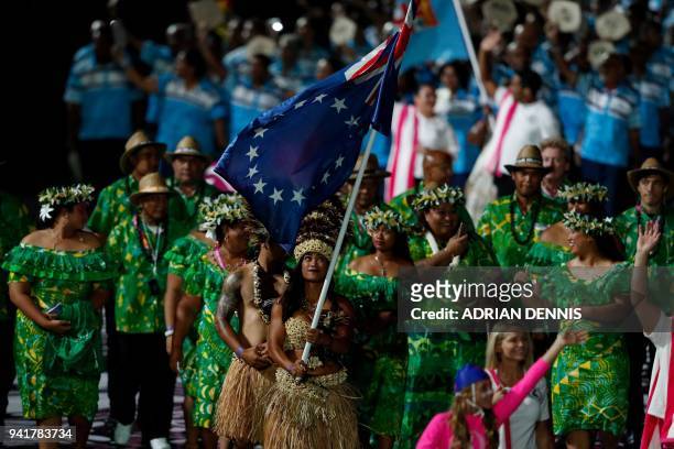 Cook Islands' flagbearer Patricia Taea leads the delegation during the opening ceremony of the 2018 Gold Coast Commonwealth Games at the Carrara...