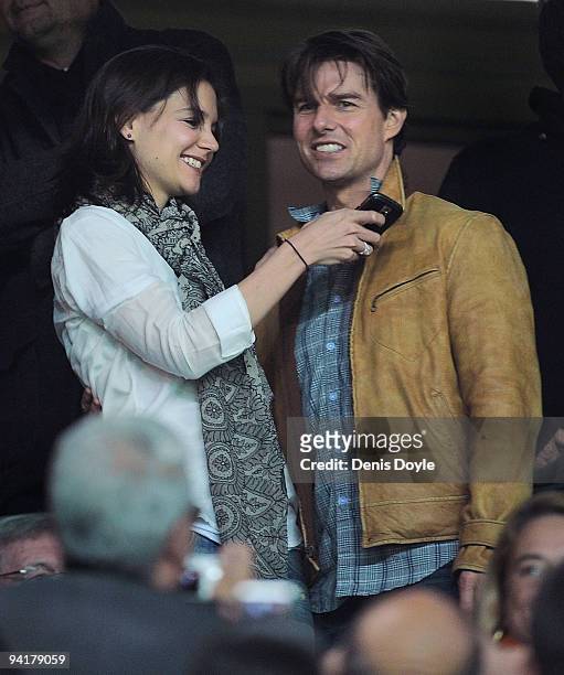 Actor Tom Cruise and his wife Katie Holmes attend the UEFA Champions League Group G match between Sevilla and Rangers FC at the Sanchez Pizjuan...
