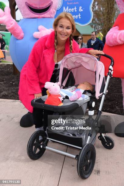 Caroline Beil with her daughter Ava Beil test the new kids area 'Peppa Pig Land 'at Heide Park Resort theme park on April 4, 2018 in Soltau, Germany.