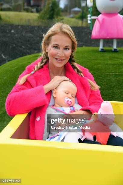 Caroline Beil with her daughter Ava Beil test the new kids area 'Peppa Pig Land 'at Heide Park Resort theme park on April 4, 2018 in Soltau, Germany.