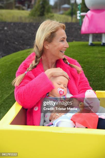 Caroline Beil with her daughter Ava Beil test the new kids area 'Peppa Pig Land 'at Heide Park Resort theme park on April 4, 2018 in Soltau, Germany.