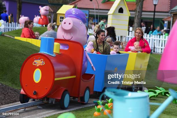 Sarah Lombardi with her son Alessio Lombardi and Caroline Beil with her daughter Ava Beil test the new kids area 'Peppa Pig Land 'at Heide Park...