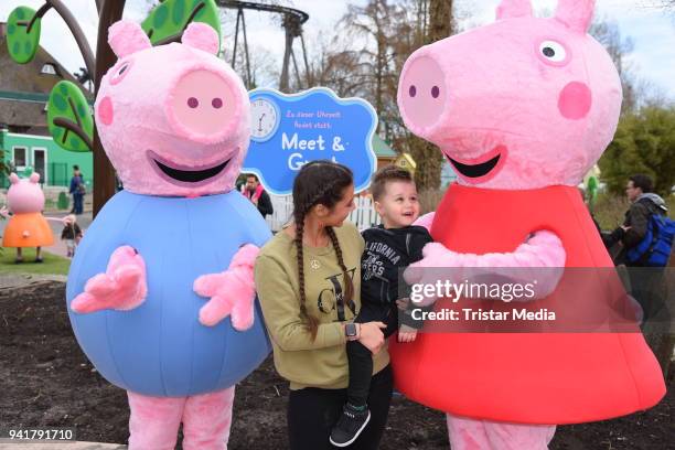 Sarah Lombardi with her son Alessio Lombardi and Caroline Beil with her daughter Ava Beil test the new kids area 'Peppa Pig Land 'at Heide Park...