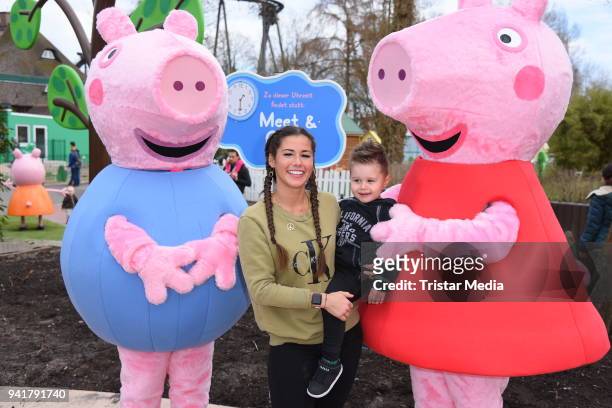 Sarah Lombardi with her son Alessio Lombardi and Caroline Beil with her daughter Ava Beil test the new kids area 'Peppa Pig Land 'at Heide Park...