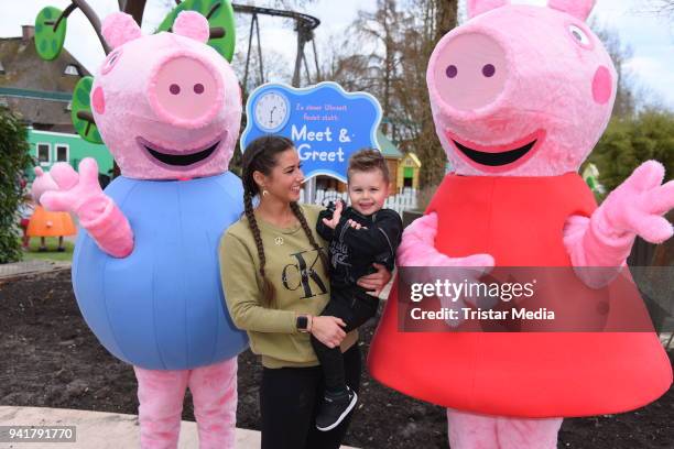 Sarah Lombardi with her son Alessio Lombardi and Caroline Beil with her daughter Ava Beil test the new kids area 'Peppa Pig Land 'at Heide Park...