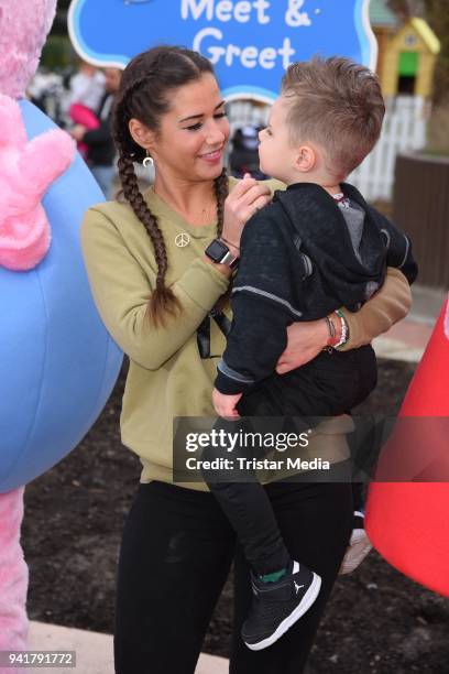 Sarah Lombardi and her son Alessio Lombardi test the new kids area 'Peppa Pig Land 'at Heide Park Resort theme park on April 4, 2018 in Soltau,...