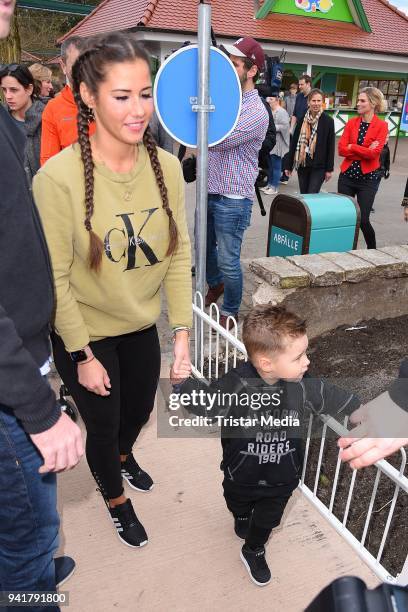 Sarah Lombardi and her son Alessio Lombardi test the new kids area 'Peppa Pig Land 'at Heide Park Resort theme park on April 4, 2018 in Soltau,...