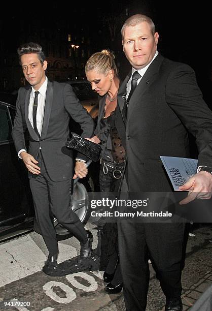 Jamie Hince steps on girlfriends Kate Moss dress as she arrives at the British Fashion Awards at The Royal Courts of Justice on December 9, 2009 in...