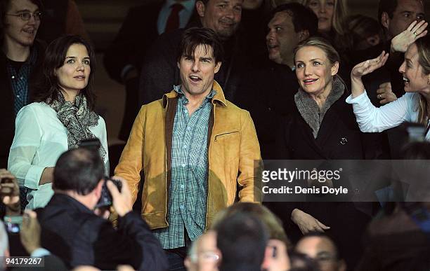 Actor Tom Cruise and his wife Katie Holmes and actress Cameroon Diaz attend the UEFA Champions League Group G match between Sevilla and Rangers FC at...