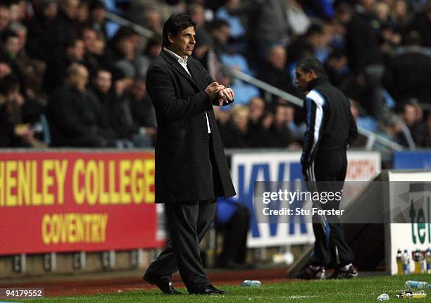 Coventry manager Chris Coleman checks his watch during the Coca-Cola Championship match between Coventry City and Newcastle United at the Ricoh Arena...