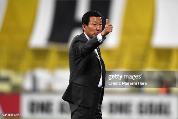 Head coach Choi Kang-hee of Jeonbuk Hyundai Motors celebrates his side's 2-0 victory in the AFC Champions League Group E match between Kashiwa Reysol...