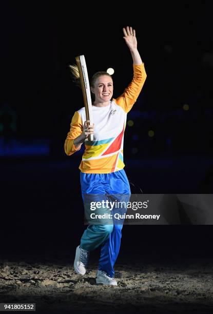 Sally Pearson carries The Queen's Baton during the Opening Ceremony for the Gold Coast 2018 Commonwealth Games at Carrara Stadium on April 4, 2018 on...