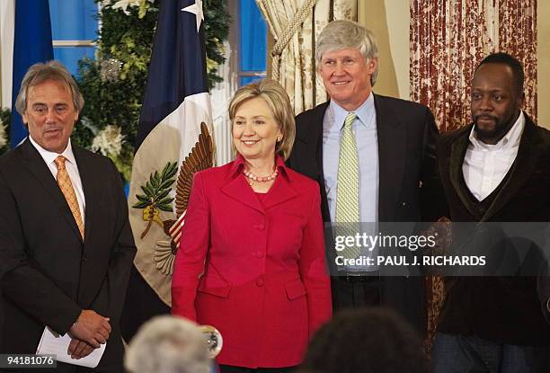 Brad Horwitz, President and CEO for Trilogy International Partners, US Secretary of State Hillary Clinton, John W. Stanton, Chairman of the Board...