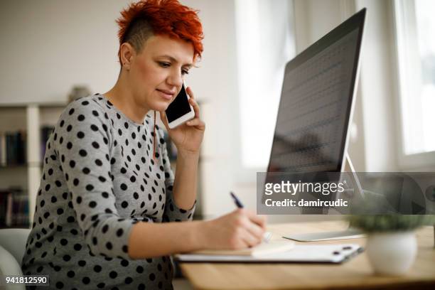 pregnant woman working from home office - form filling stock pictures, royalty-free photos & images