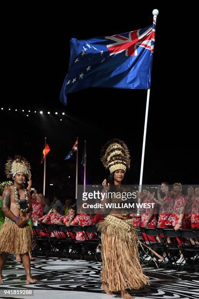 Cook Islands' flagbearer Patricia Taea leads the delegation during the opening ceremony of the 2018 Gold Coast Commonwealth Games at the Carrara...