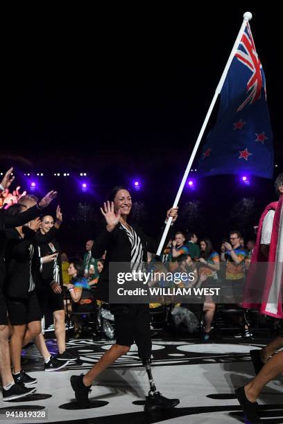 New Zealand's flagbearer Sophie Pascoe leads the delegation during the opening ceremony of the 2018 Gold Coast Commonwealth Games at the Carrara...