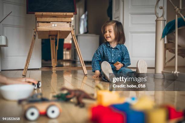 time for playing with toys - baby eating toy stock pictures, royalty-free photos & images