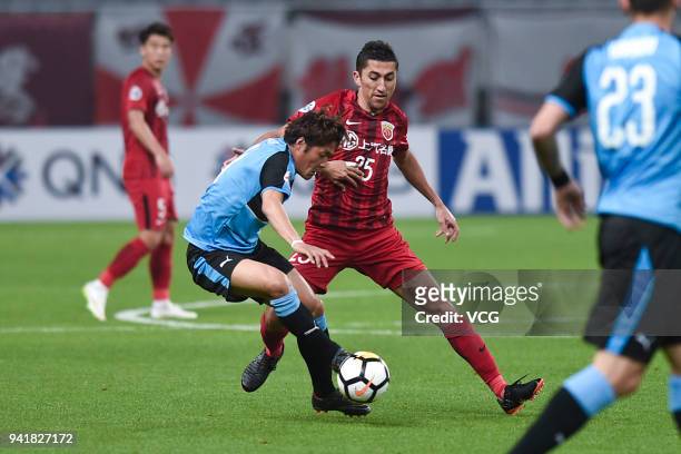 Odil Ahmedov of Shanghai SIPG follows the ball during AFC Champions League Group F match between Shanghai SIPG and Kawasaki Frontale at the Shanghai...